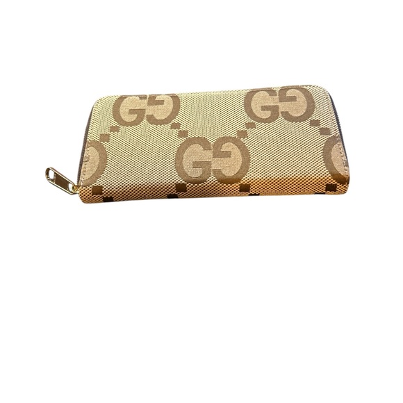 Gucci Handbags - Gucci Jumbo GG Canvas Zip Around Wallet